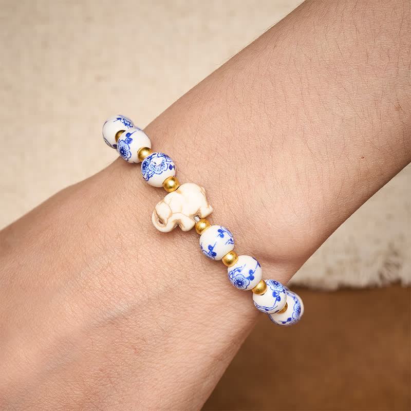 Buddha Stones Pulsera redonda de cuentas florales con forma de elefante de porcelana blanca - image 4