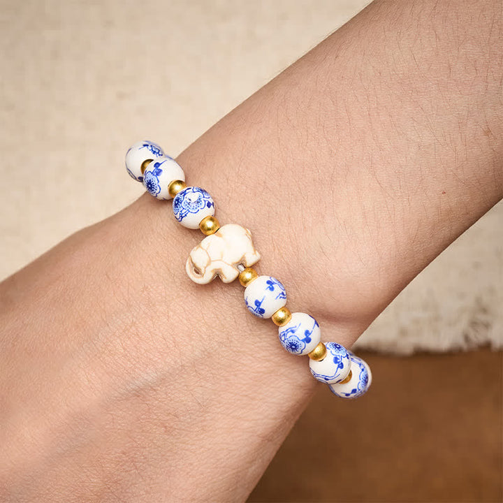 Buddha Stones Pulsera redonda de cuentas florales con forma de elefante de porcelana blanca - image 4
