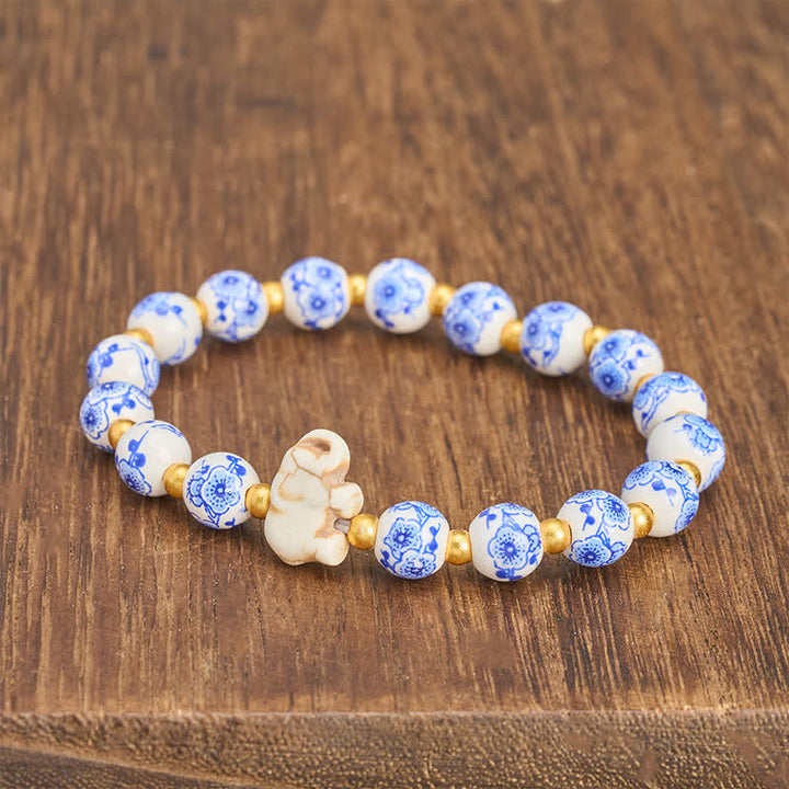 Buddha Stones Pulsera redonda de cuentas florales con forma de elefante de porcelana blanca - image 3
