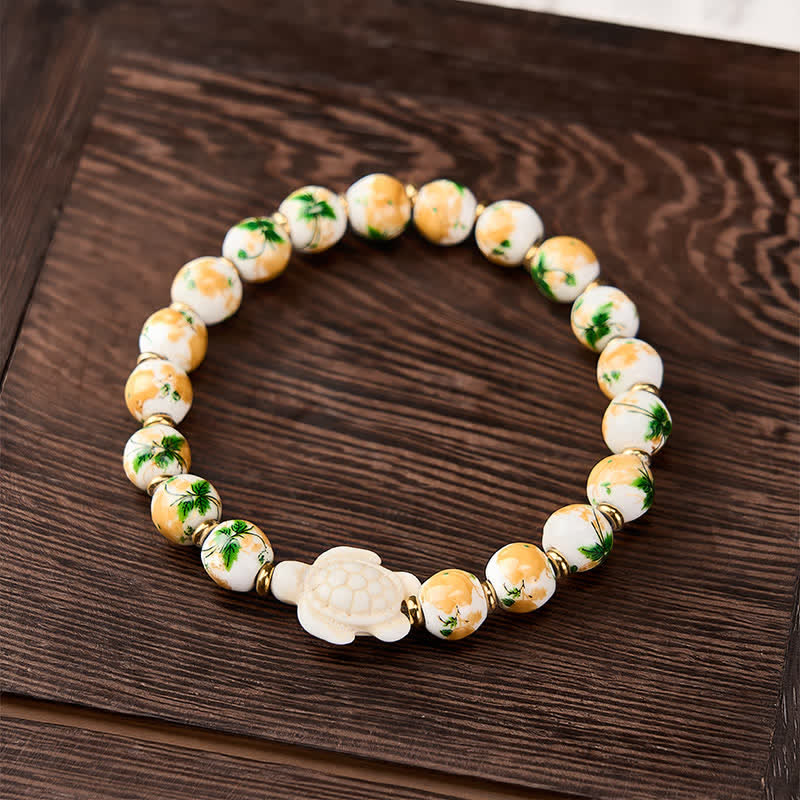 Buddha Stones Pulsera de la riqueza con diseño de tortuga y turquesa blanca natural - image 1
