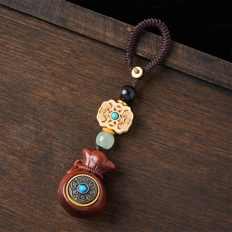 Buddha Stones Llaveros de serenidad con diseño de monedero chino de monedas chinas de sándalo rojo y verde, Om Mani Padme Hum. - image 1