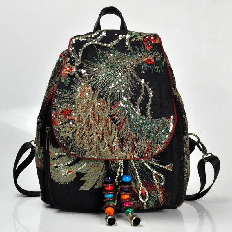 Mochila con borlas de lona con bordado de pavo real - image 1
