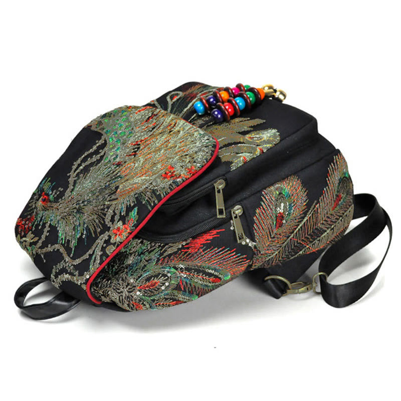 Mochila con borlas de lona con bordado de pavo real - image 3