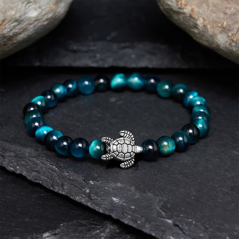Buddha Stones Pulsera poderosa de tortuga de cobre con ojo de tigre azul - Ojo de tigre azul de 6 mm (circunferencia de la muñeca: 14-15 cm) - image 0