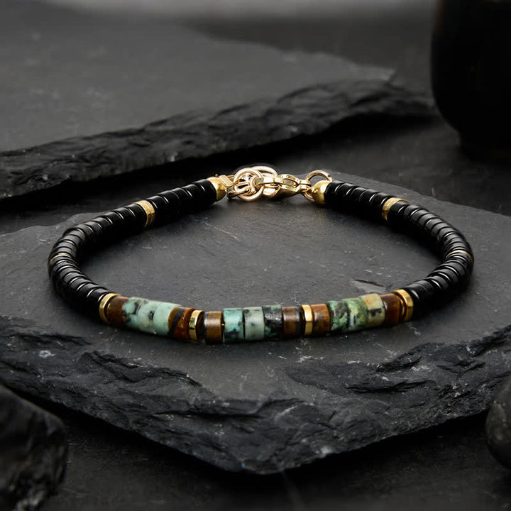 Buddha Stones Pulsera de cuentas redondas de protección de ónix negro y turquesa - image 1