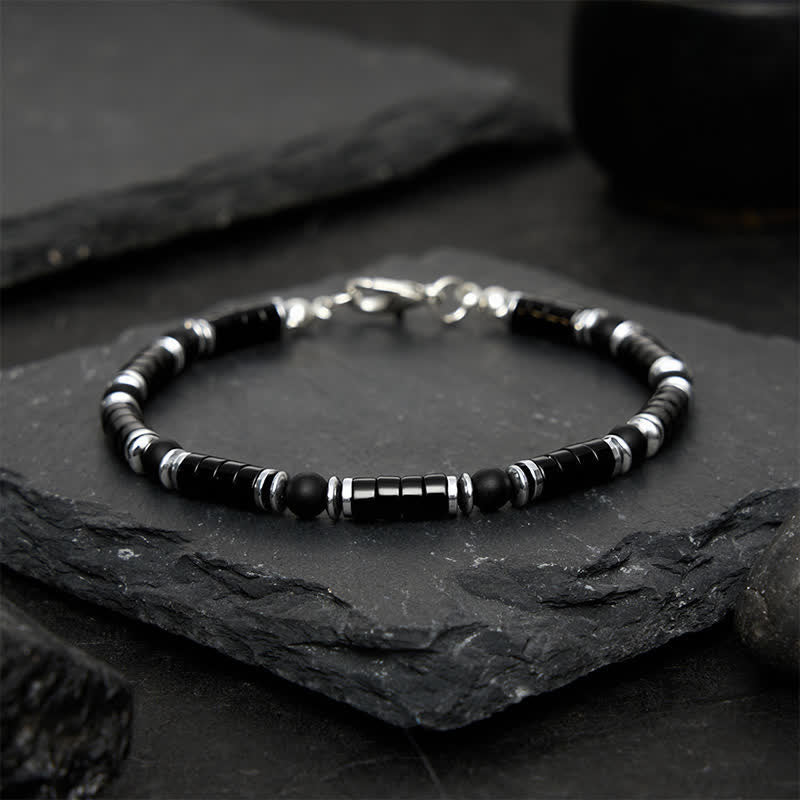 Buddha Stones Pulsera protectora con cuentas espaciadoras cilíndricas esmeriladas de ónix negro - image 1