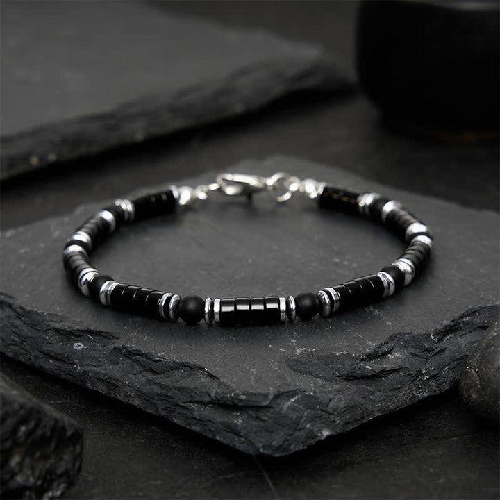 Buddha Stones Pulsera protectora con cuentas espaciadoras cilíndricas esmeriladas de ónix negro - image 1