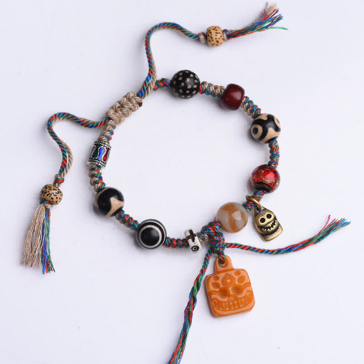 Buddha Stones Pulsera tibetana de cuentas Dzi, hueso trenzado, hilo multicolor, bendiciones - image 1