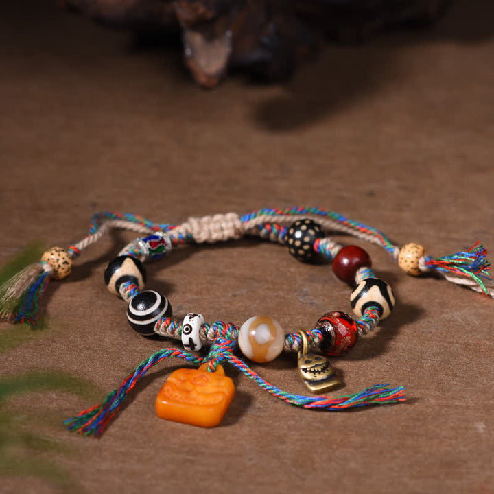 Buddha Stones Pulsera tibetana de cuentas Dzi, hueso trenzado, hilo multicolor, bendiciones - image 4