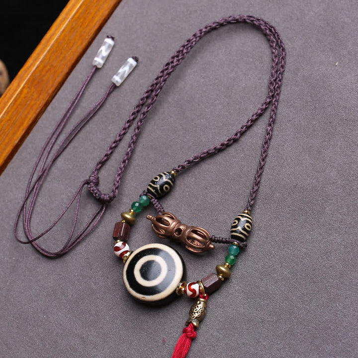 Buddha Stones Collar de protección con cuentas Dzi tibetanas, vajra, cuentas Dzi de tres ojos y cuerda trenzada. - Aprox. 24 × 10 mm - image 0