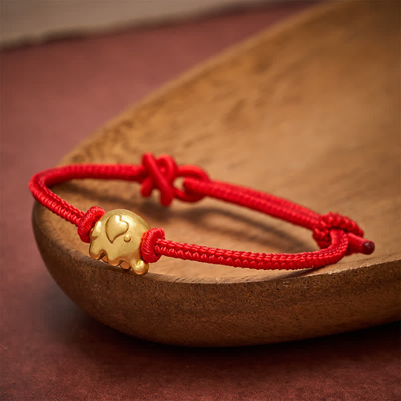 Buddha Stones Pulsera de protección de cobre con forma de elefante y cuerda roja - image 1
