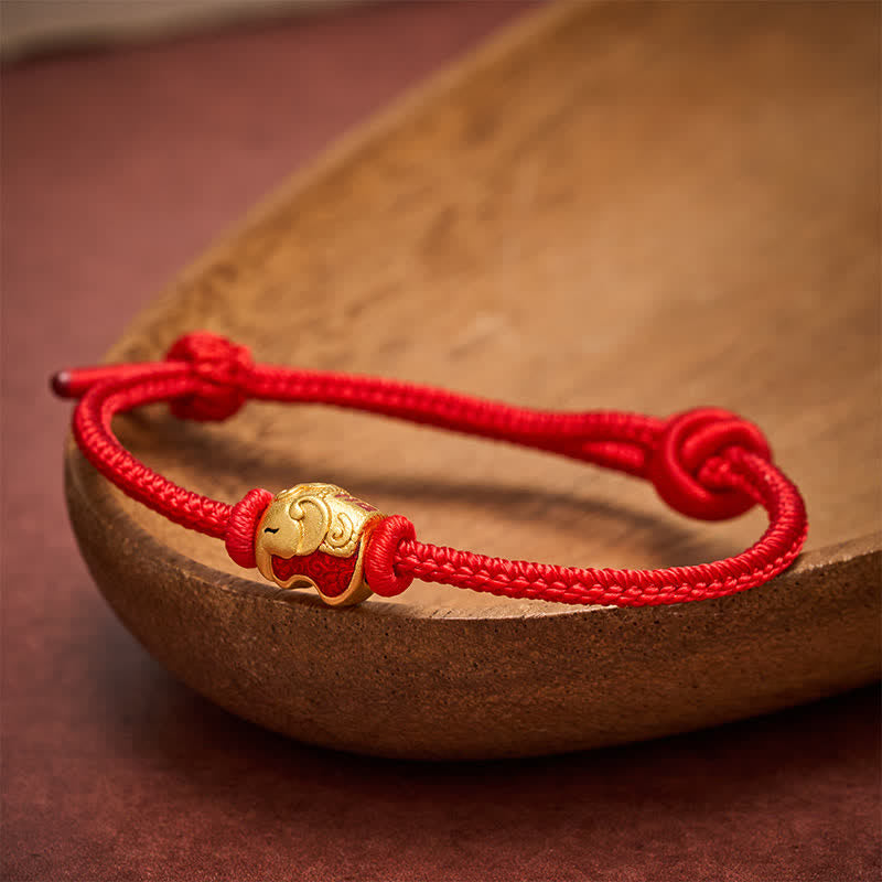Buddha Stones Pulsera de cobre con elefante y cuerda roja - image 1