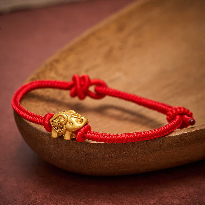 Buddha Stones Pulsera de fuerza de cobre con hilo rojo de elefante - image 1