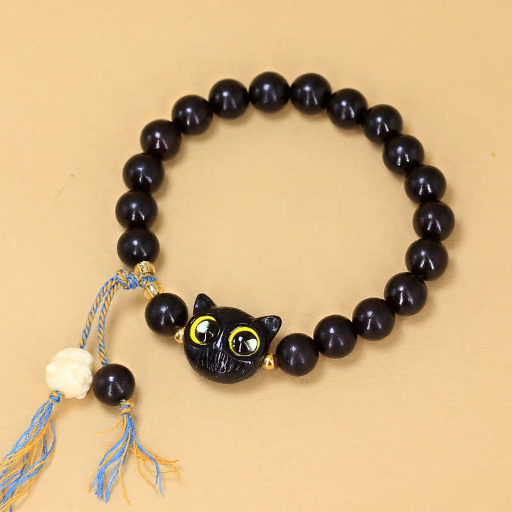 Buddha Stones Pulsera redonda trenzada con dije de gato de madera de ébano - image 2