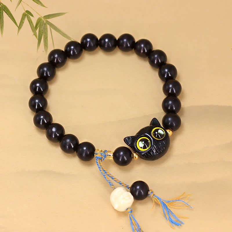 Buddha Stones Pulsera redonda trenzada con dije de gato de madera de ébano - image 1