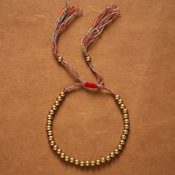 Buddha Stones Pulsera de equilibrio con cuentas de cobre y cordón rojo - image 2
