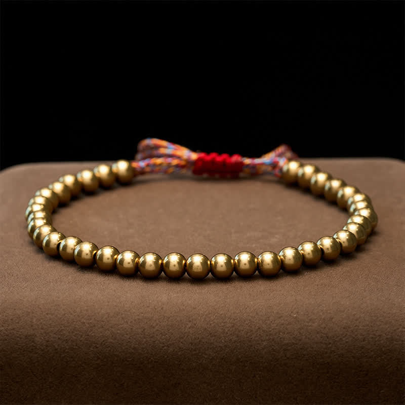 Buddha Stones Pulsera de equilibrio con cuentas de cobre y cordón rojo - image 4