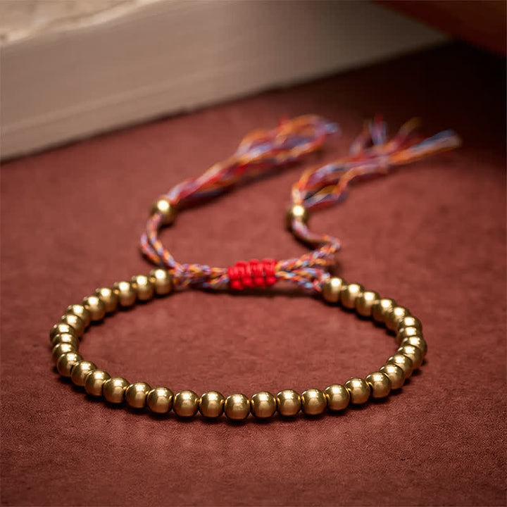 Buddha Stones Pulsera de equilibrio con cuentas de cobre y cordón rojo - Cobre (Riqueza ♥ Suerte) - image 0