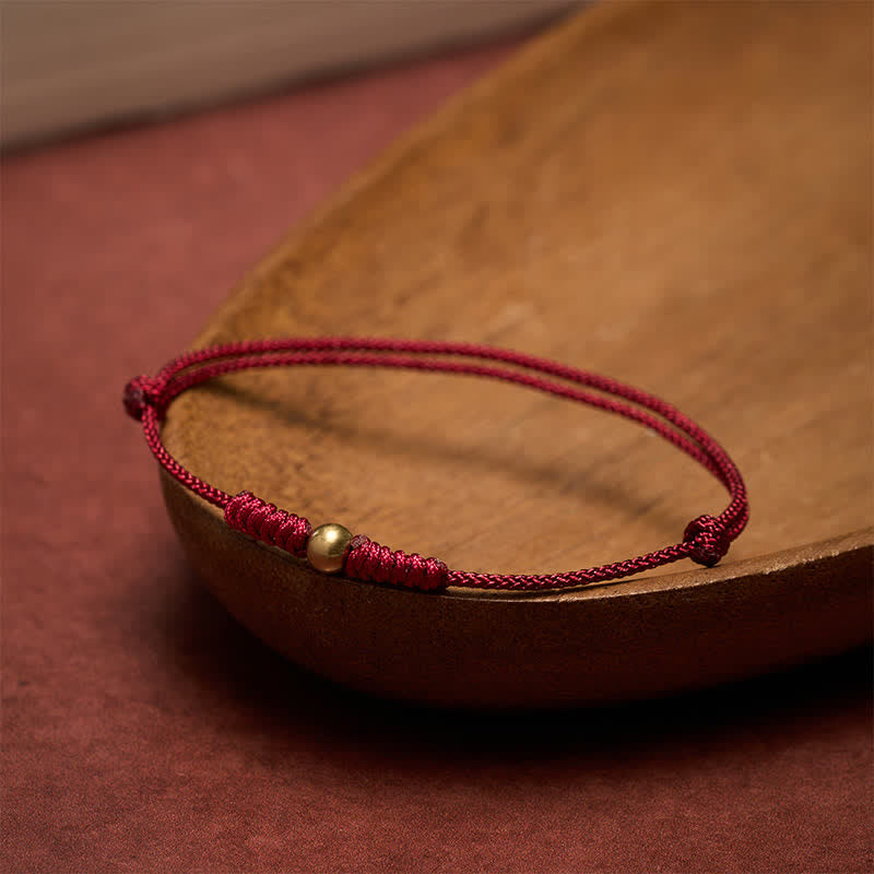 Buddha Stones Pulsera de conexión de cuentas de cobre con hilo rojo - image 1