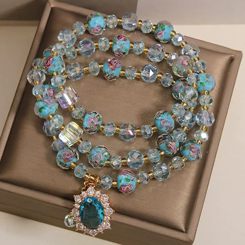Buddha Stones Pulsera de triple vuelta con dije ovalado floral de cuentas de vidrio Blue Liuli y dije de cristal azul. - image 2