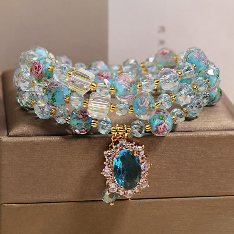 Buddha Stones Pulsera de triple vuelta con dije ovalado floral de cuentas de vidrio Blue Liuli y dije de cristal azul. - image 8