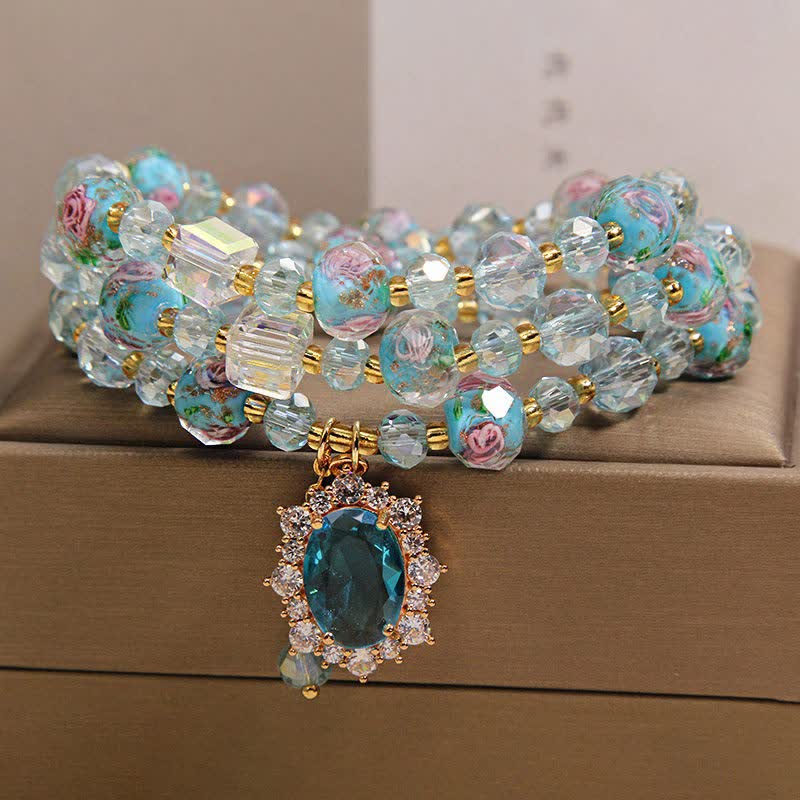 Buddha Stones Pulsera de triple vuelta con dije ovalado floral de cuentas de vidrio Blue Liuli y dije de cristal azul. - image 9