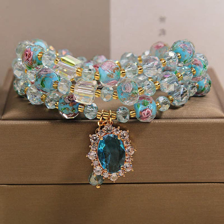 Buddha Stones Pulsera de triple vuelta con dije ovalado floral de cuentas de vidrio Blue Liuli y dije de cristal azul. - image 7