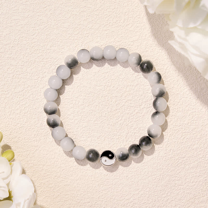 Buddha Stones Pulsera de equilibrio bicolor Yin Yang con cuentas planas de aleación y cristal - image 1
