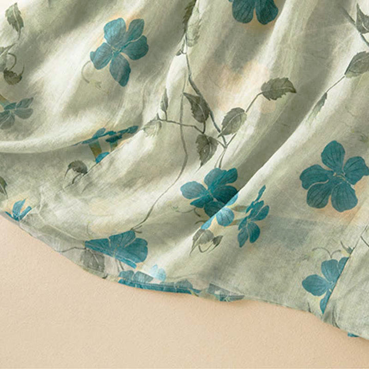 Vestido midi de manga corta con estampado floral en contraste de colores y estampado de Buddha Stones, con bolsillos. - image 11