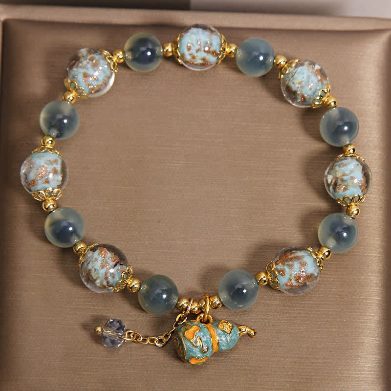 Buddha Stones Pulsera con dije de calabaza de cristal Liuli de ágata azul caramelo - image 1