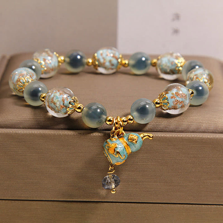 Buddha Stones Pulsera con dije de calabaza de cristal Liuli de ágata azul caramelo - Ágata de caramelo (Amor ♥ Alegría) - image 0