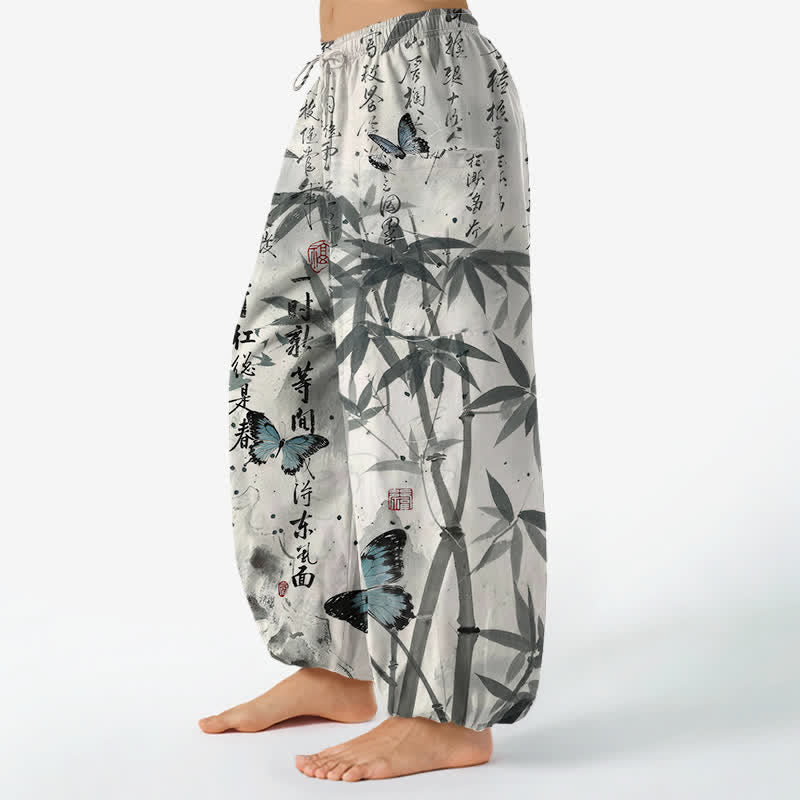 Buddha Stones Pantalones harem de mujer con cintura elástica y bolsillos laterales, estampado de mariposas de bambú y tinta de algodón. - image 1