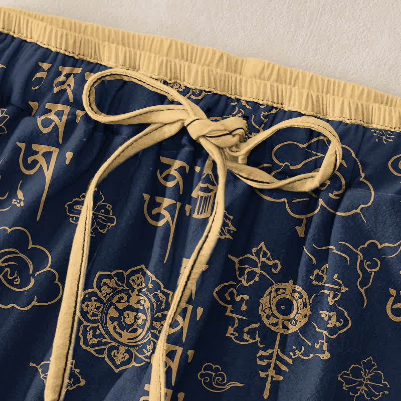 Buddha Stones Pantalones de mujer de algodón puro con estampado de escritura tibetana, cintura elástica y bolsillos. - image 1