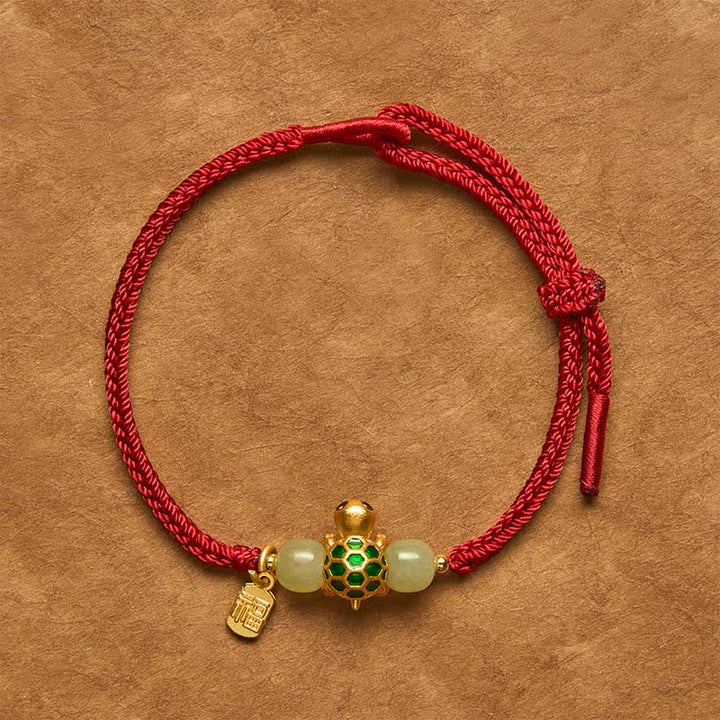 Buddha Stones Pulsera de la suerte de jade rojo Hetian con forma de tortuga de cobre y carácter Fu. - Pulsera de hilo rojo con forma de tortuga - 5,5–7,1 pulgadas (14–18 cm) - image 0