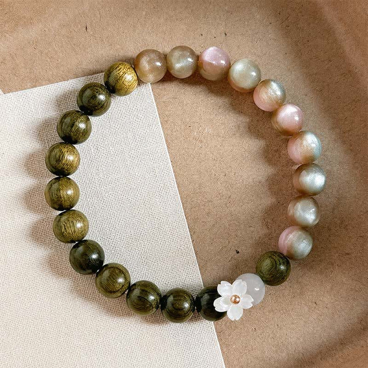 Buddha Stones Pulsera Serenity con dije de flor de ojo de gato y sándalo verde - image 2