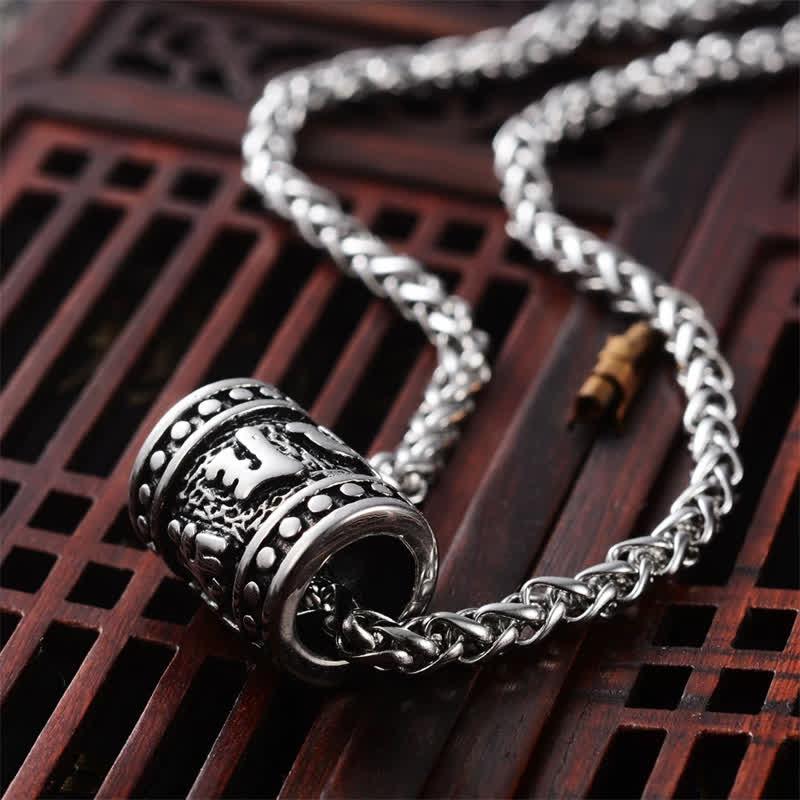 Buddha Stones Collar cilíndrico tallado en relieve con el símbolo Om Mani Padme Hum de acero de titanio para protección y sabiduría. - image 1