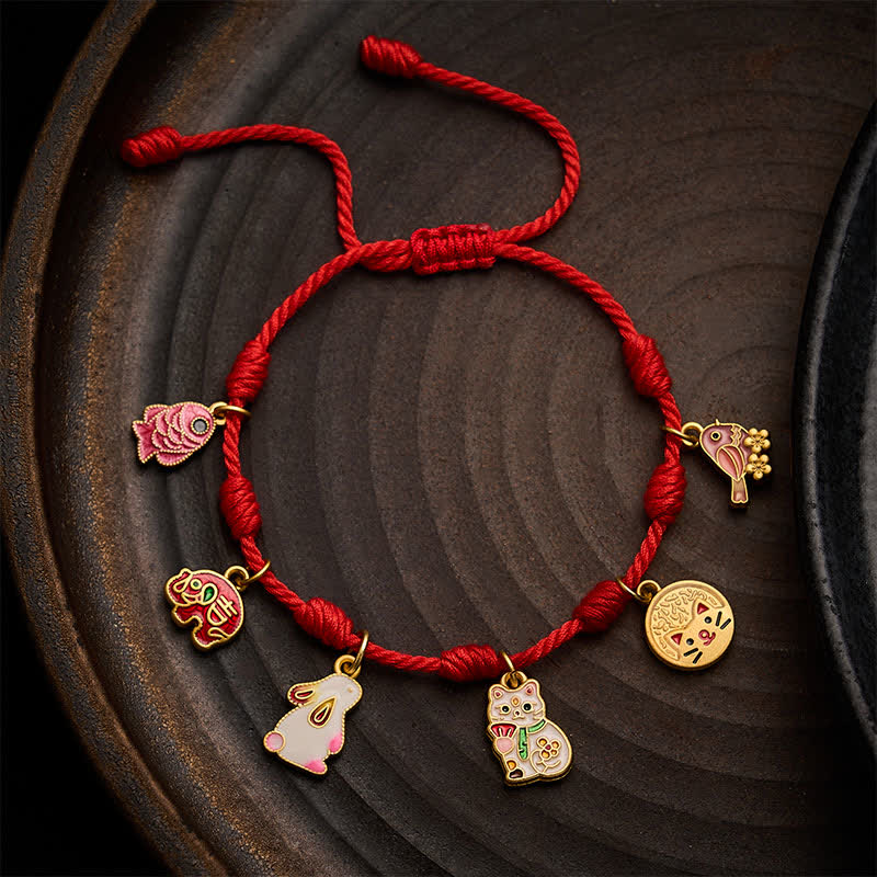 Buddha Stones Pulsera de la suerte hecha a mano con hilo rojo de siete nudos, con forma de pez koi, elefante, conejo, gato y urraca púrpura. - Rojo (Circunferencia de la muñeca: 5,9–7,5 pulgadas / 15–19 cm) - image 0