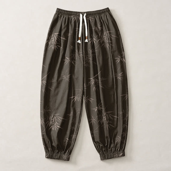 Buddha Stones Pantalones harem para hombre de algodón puro con estampado de hojas de bambú, cordón ajustable y bolsillos. - image 1
