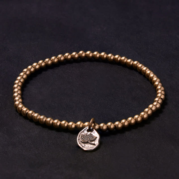 Buddha Stones Pulsera curativa con dije de loto y cuentas de cobre - image 1