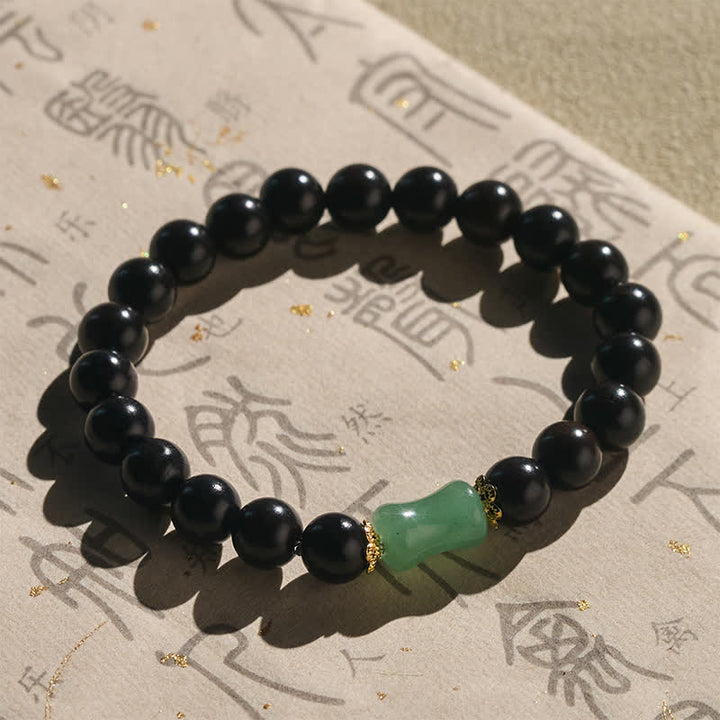 Buddha Stones Pulsera unisex de madera de ébano verde con vetas naturales - image 1