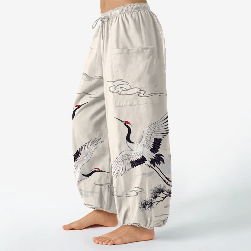 Buddha Stones Pantalones harem de algodón blanco con estampado de grullas y cintura elástica para mujer, con bolsillos laterales. - image 1