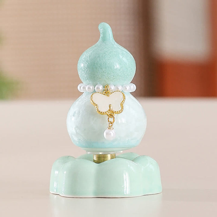 Buddha Stones Decoración giratoria de cerámica con forma de calabaza mariposa para un estilo de vida consciente. - Calabaza verde + mariposa blanca + base verde - image 25