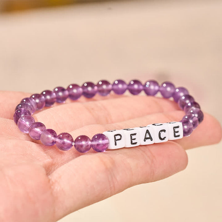 Buddha Stones Pulsera de meditación con cuentas de amatista con la inscripción PAZ - image 2