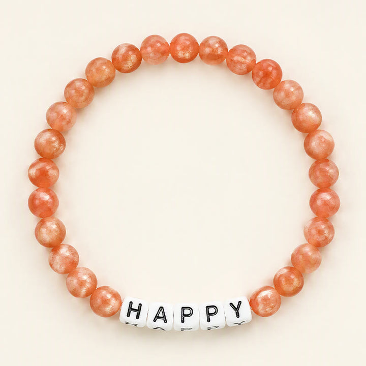 Buddha Stones Pulsera con cuentas positivas de piedras solares y letras HAPPY - Piedra del Sol (Riqueza Positiva ♥) - image 0