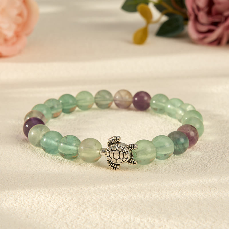 Buddha Stones Pulsera de cuentas de fluorita multicolor con forma de tortuga, que ofrece claridad y protección. - Tortuga (Circunferencia de la muñeca: 7,1–7,5 pulgadas/18–19 cm) - image 0
