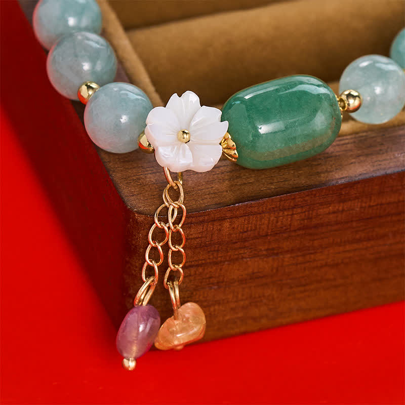 Buddha Stones Pulsera elástica protectora con dije de flor de jade - image 9