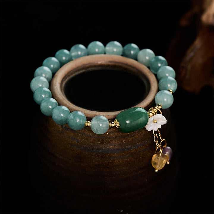 Buddha Stones Pulsera elástica protectora con dije de flor de jade - image 2