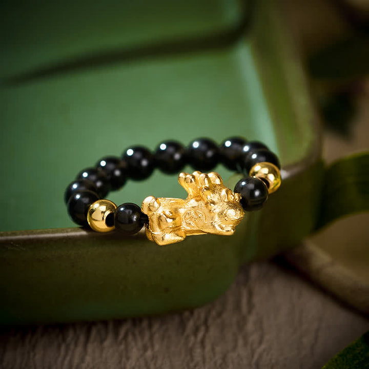 Buddha Stones Anillo mini elástico de cuentas Pi Xiu de cobre y obsidiana negra para sanación y energía. - Grande: Se ajusta a las tallas 8-10 de US. - image 0