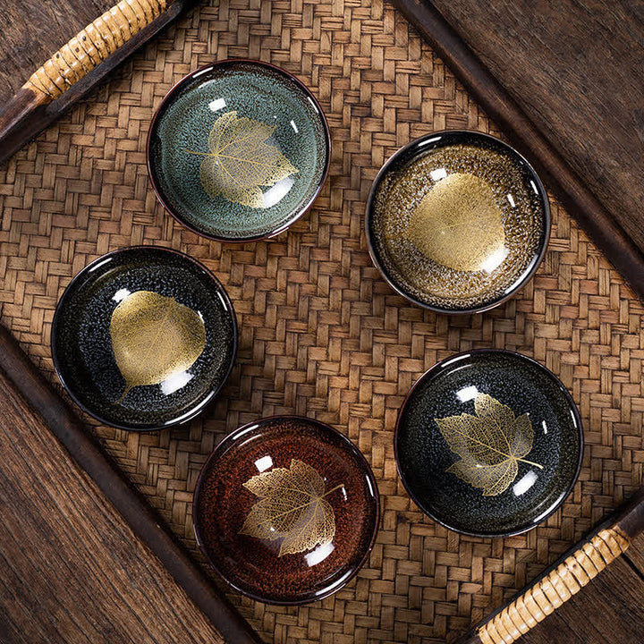 Buddha Stones Taza de té de cerámica con diseño de hoja de arce moteada oscura - image 0