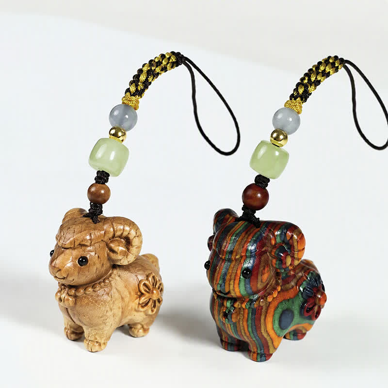 Buddha Stones Llaveros tallados a mano de eucalipto arcoíris, sándalo y cabra, con el tema "Serenidad". - image 0